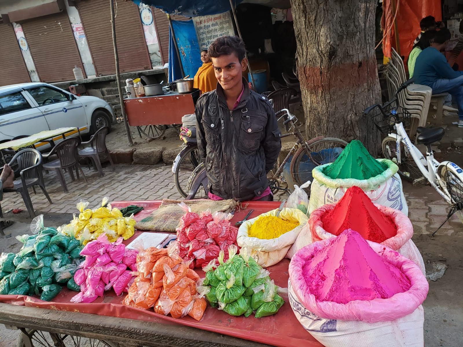Boy selling color powder- Vrindavan